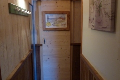Nouveauté : porte menant au sauna et à la nouvelle douche